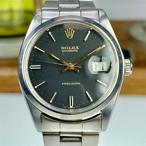 The Rolex Oysterdate Precision 6694 watch hands